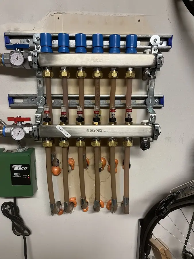 Plumber performing Leak Detection at a residential property in Northport